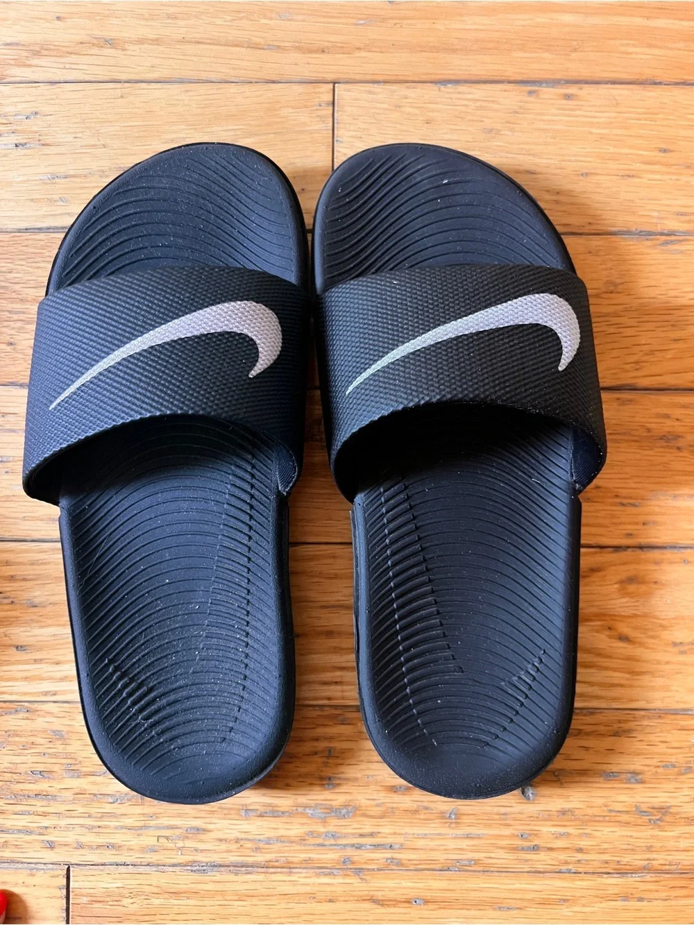 Nike Black Slide Sandals with White Swoosh